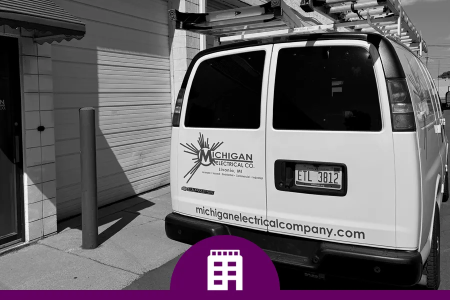 commercia electrical service michigan electrical company van in front of a commercial building